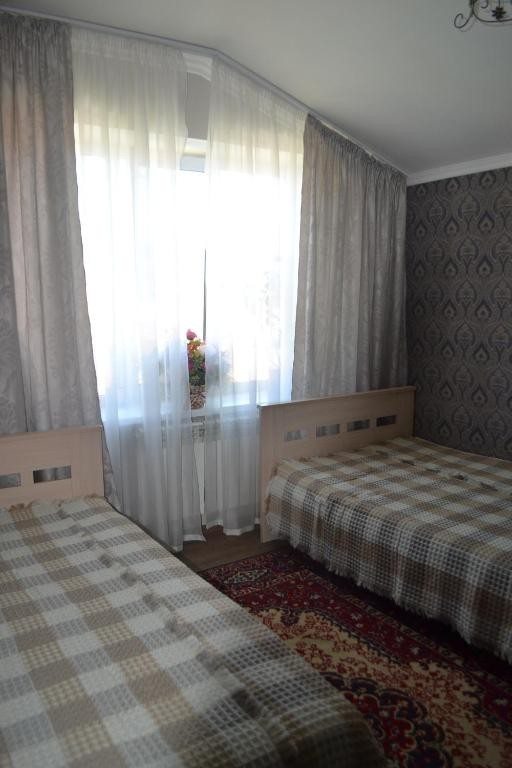 Двухместный (Двухместный номер с 2 отдельными кроватями) гостевого дома Rent House, Ростов-на-Дону