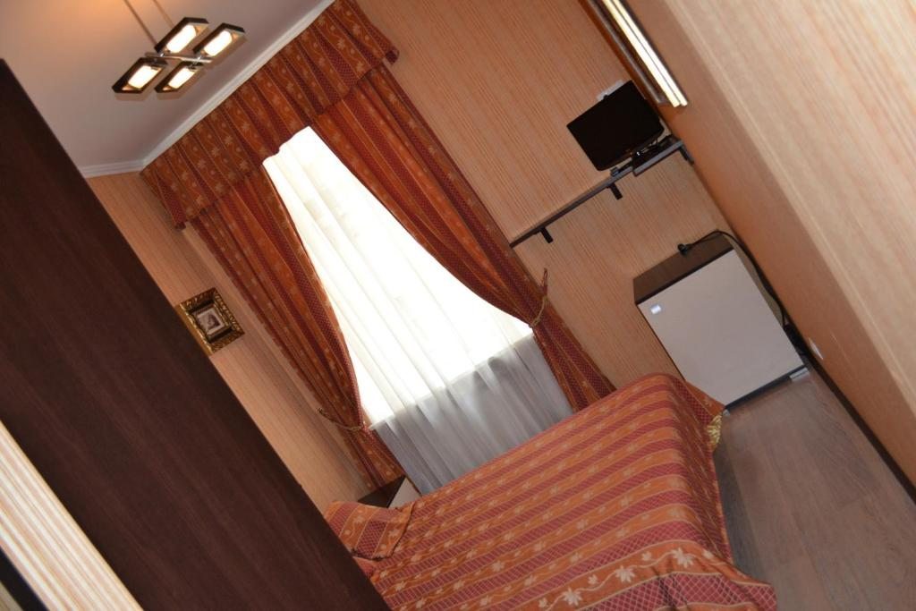 Двухместный (Бюджетный двухместный номер с 1 кроватью или 2 отдельными кроватями) апарт-отеля Castle Sennaya, Санкт-Петербург