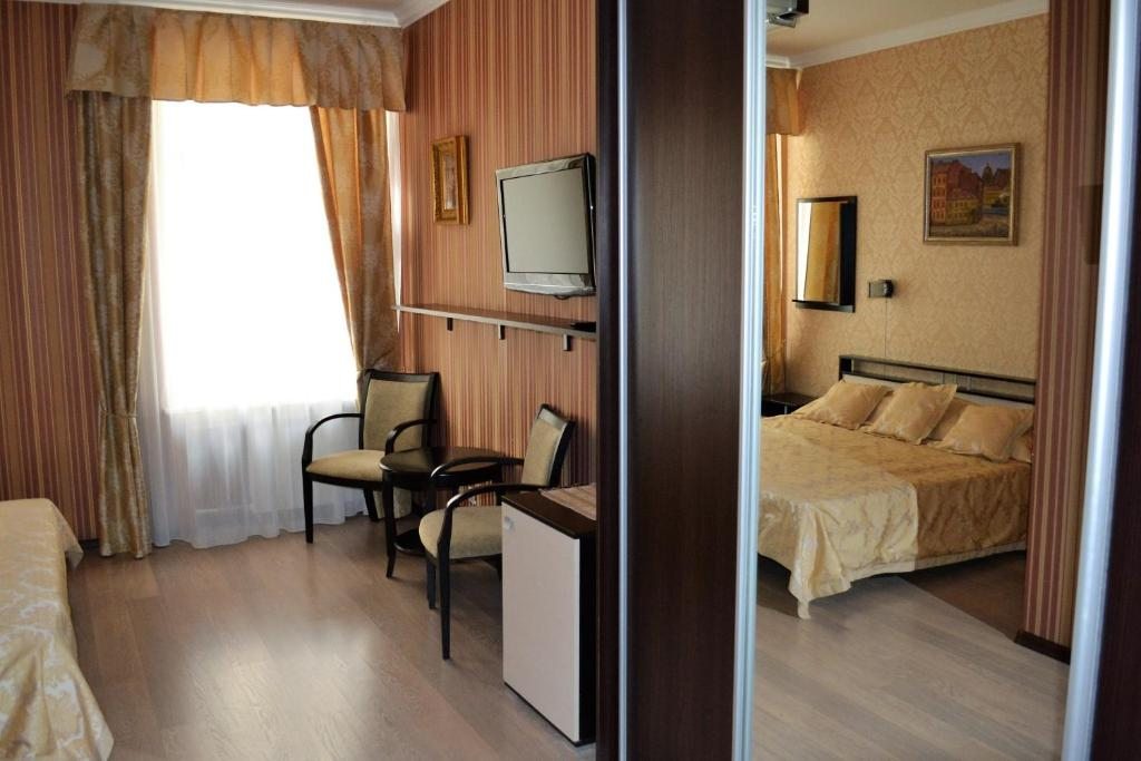 Двухместный (Улучшенный двухместный номер с 1 кроватью или 2 отдельными кроватями) апарт-отеля Castle Sennaya, Санкт-Петербург