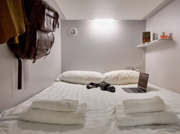 Фотография номера хостела Капсульный отель Оранжевое небо