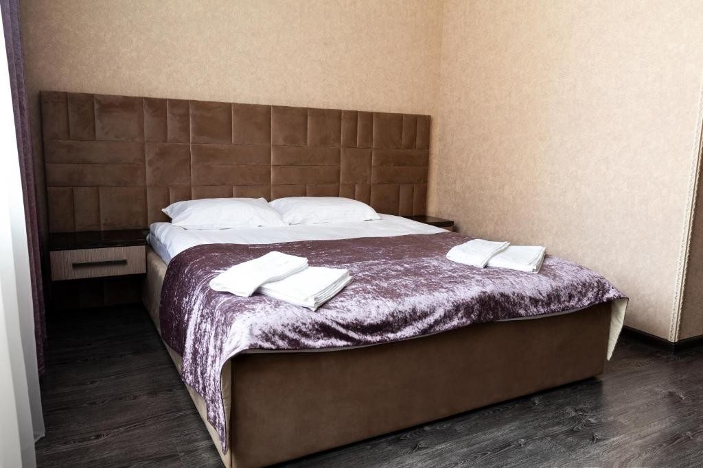 Двухместный (Двухместный номер Делюкс с 1 кроватью и душем) отеля Веста, Ачинск