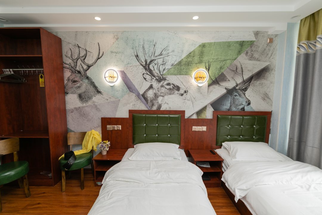 Двухместный (Бюджетный двухместный номер с двумя односпальными кроватями с видом на город) отеля Holiday, Владивосток