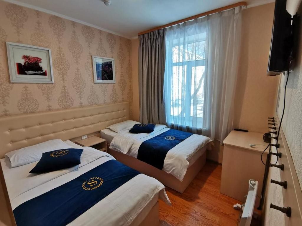 Двухместный (Бюджетный двухместный номер с 2 отдельными кроватями) отеля Золотой феникс, Владивосток