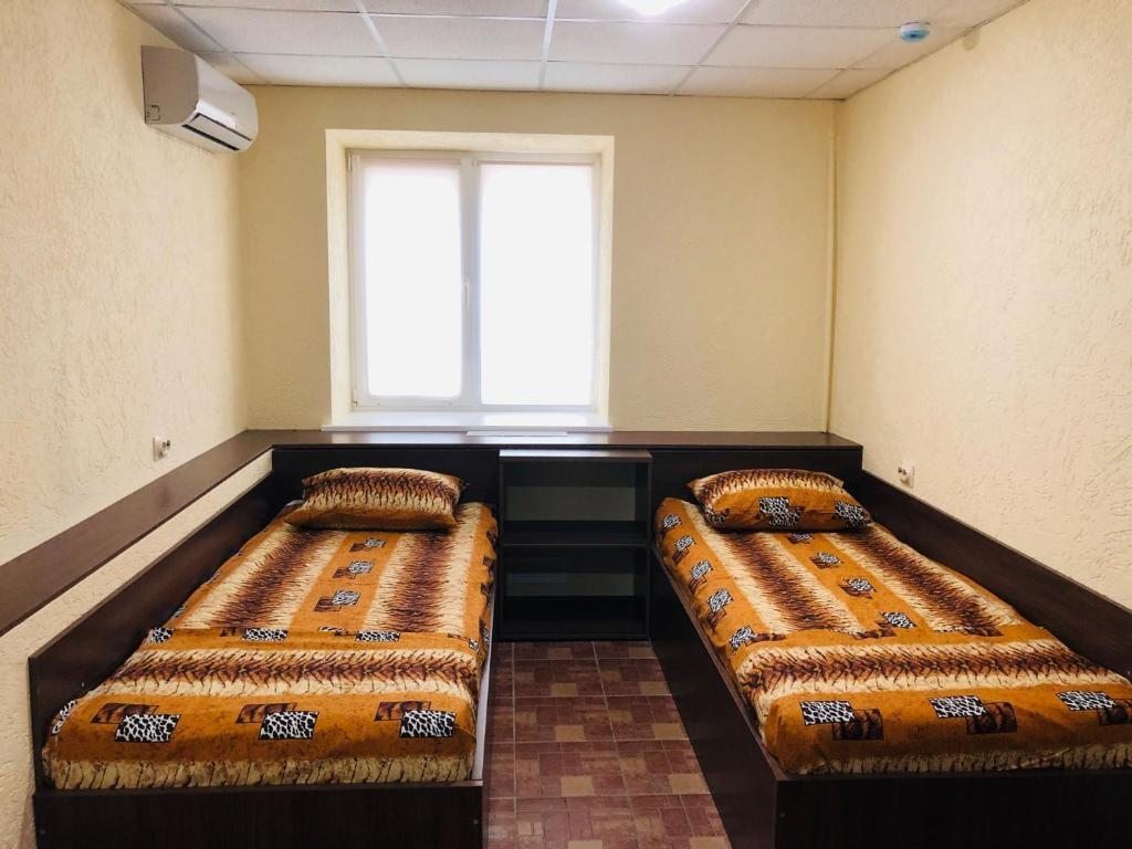 Двухместный (Двухместный номер с 2 отдельными кроватями и ванной комнатой) мини-отеля Time Ladya, Самара