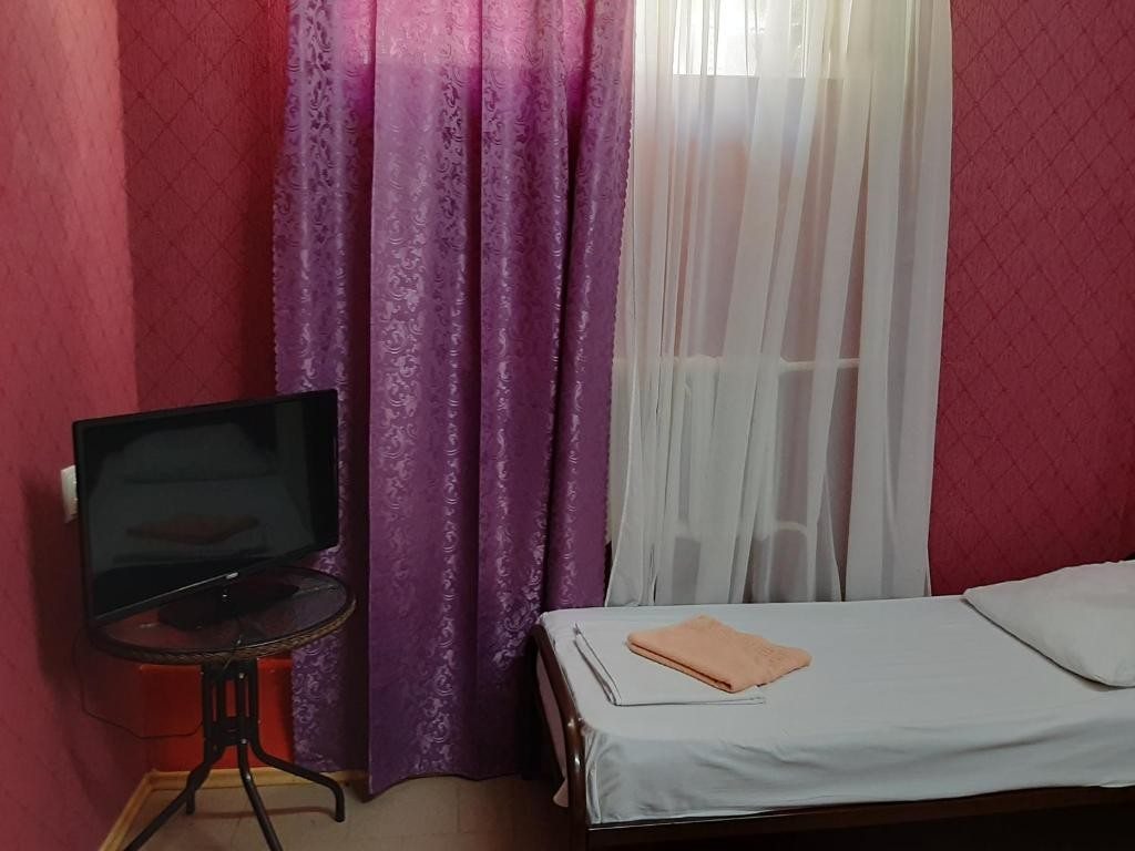 Двухместный (Бюджетный двухместный номер с 2 отдельными кроватями) хостела На Кутузова, 30, Краснодар