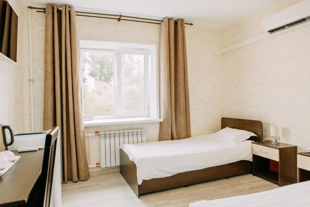 Двухместный (Стандартный двухместный номер с 2 отдельными кроватями) гостиницы Золотая Ригма, Хабаровск