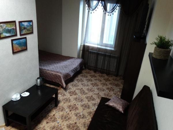 Четырехместный (Улучшенный четырехместный номер) гостиницы Алтайская, Барнаул
