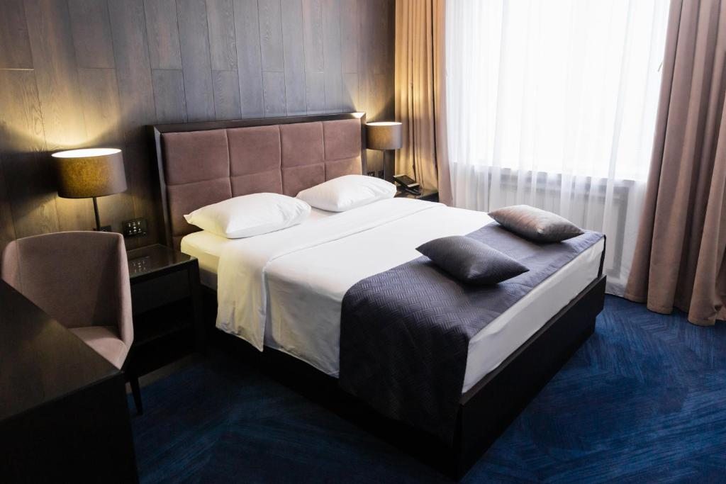 Двухместный (Стандартный двухместный номер с 1 кроватью или 2 отдельными кроватями) отеля Seasons&Harten, Курск