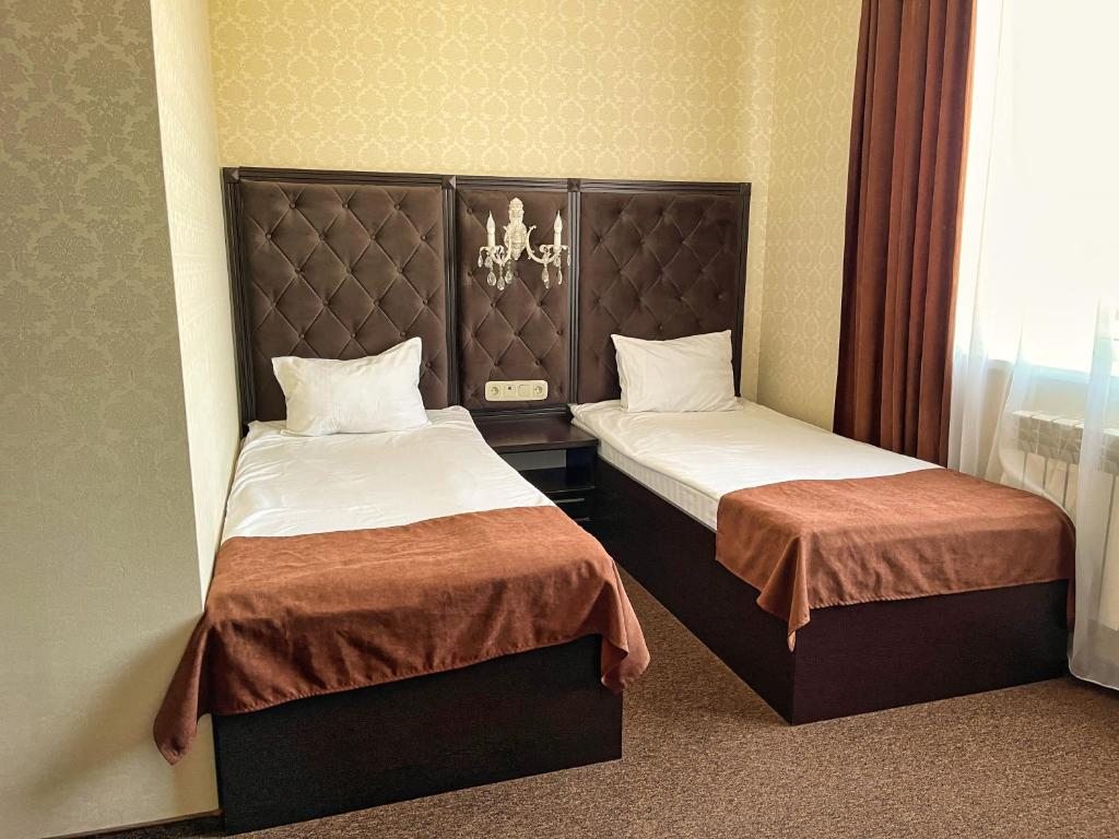 Двухместный (Двухместный номер Делюкс с 2 отдельными кроватями) отеля Рестотель Оскар, Курск