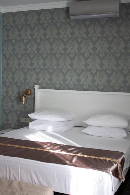 Двухместный (Двухместный номер с двуспальной кроватью и дополнительной кроватью) апарт-отеля Марфуга, Железноводск