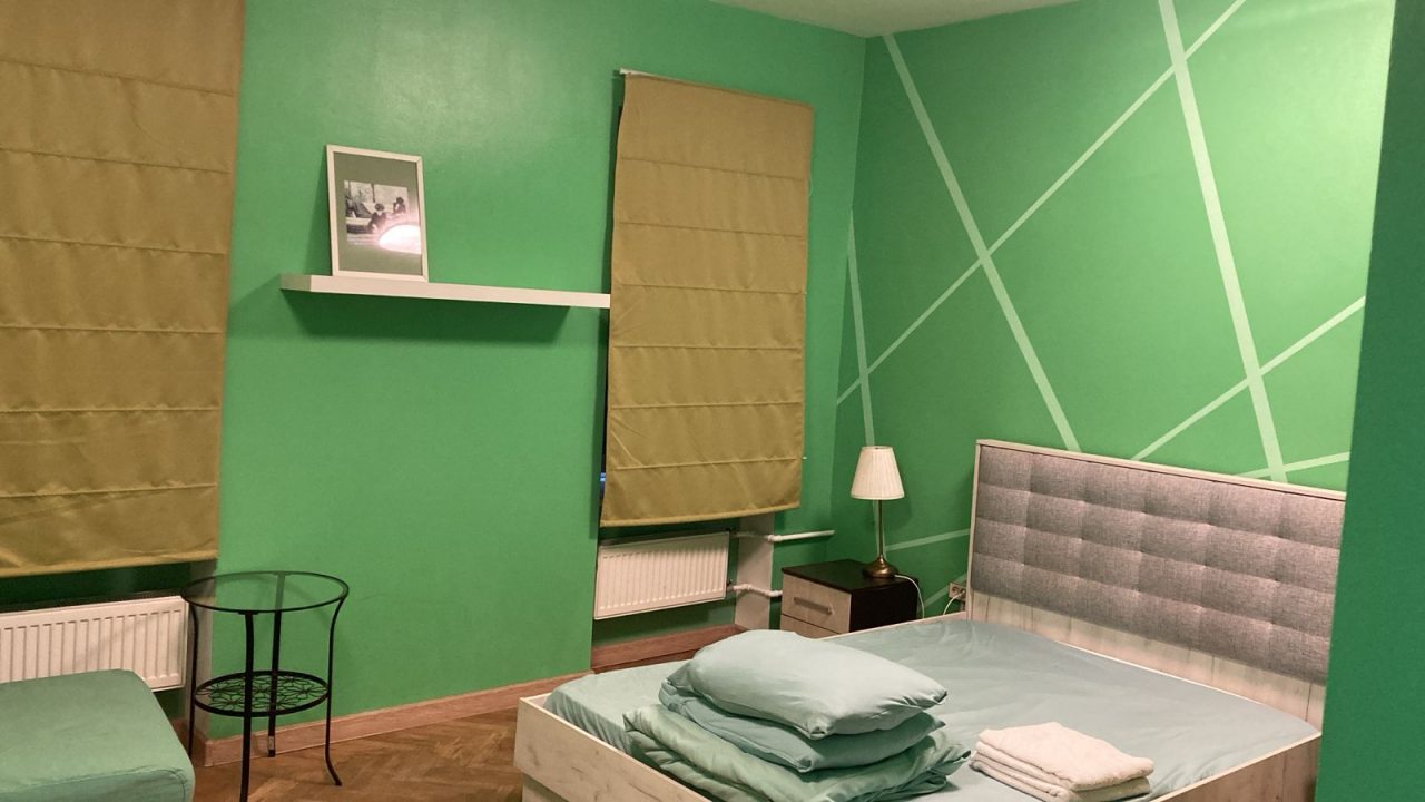 Улучшенная комната на троих с удобствами на этаже