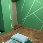 Улучшенная комната на троих с удобствами на этаже