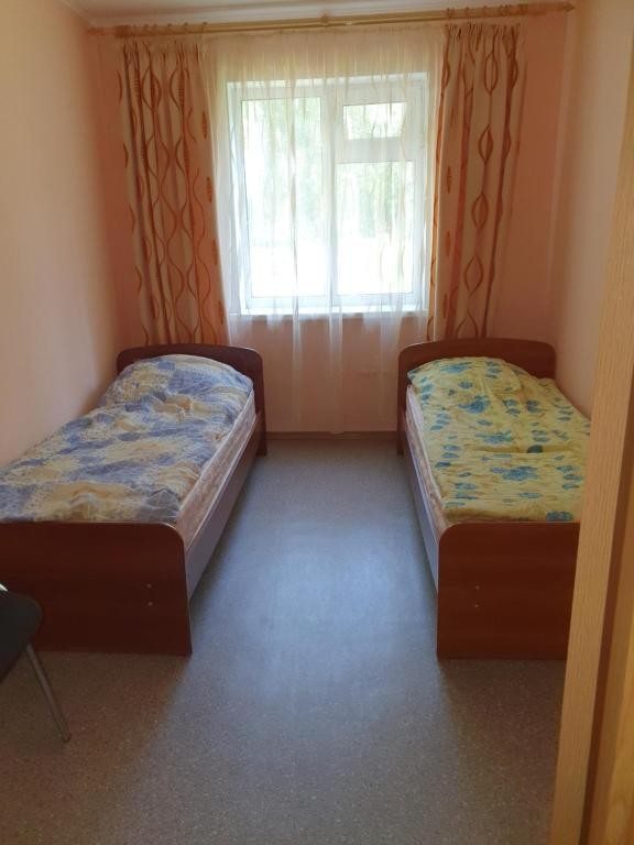 Двухместный (Двухместный номер с 2 отдельными кроватями) гостевого дома База отдыха Ласточка, Посольское