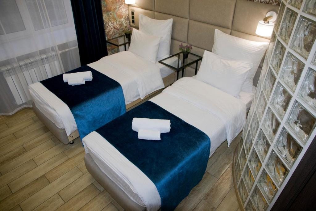 Двухместный (Улучшенный двухместный номер с 1 кроватью или 2 отдельными кроватями) мини-отеля Барбарис, Березники