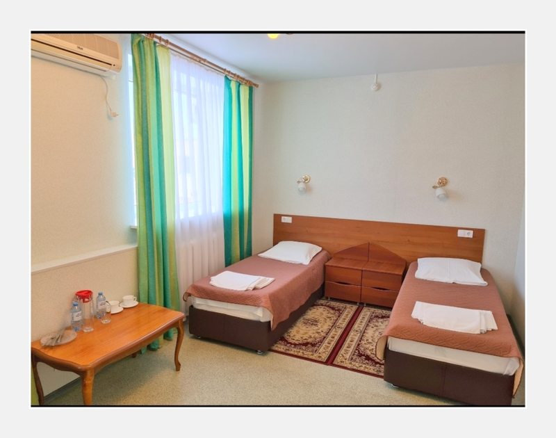 Двухместный (Комфорт двухместный номер с  2 отдельными кроватями) гостиницы Плёс, Волжский