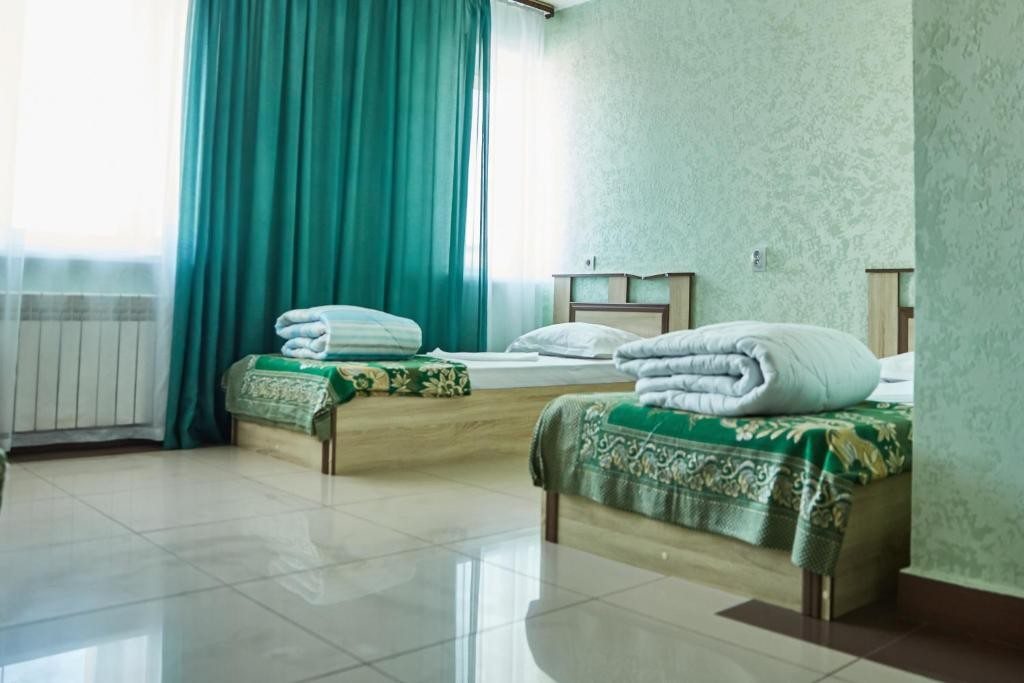 Номер (Односпальная кровать в общем номере для женщин) гостиницы Премиум, Благовещенск (Амурская область)