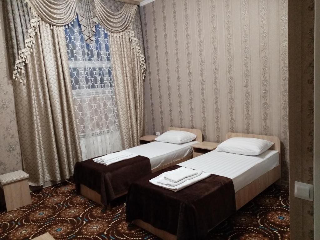 Двухместный (Бюджетный двухместный номер с 2 отдельными кроватями) отеля Крымский Путь, Темрюк