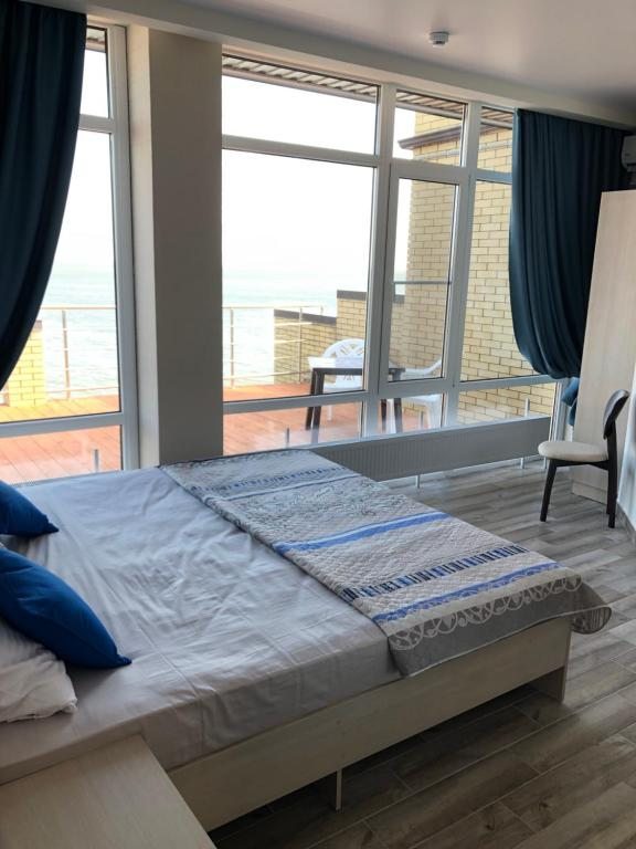 Двухместный (Двухместный номер Делюкс с 2 отдельными кроватями и видом на море) гостевого дома Шторм, Таганрог