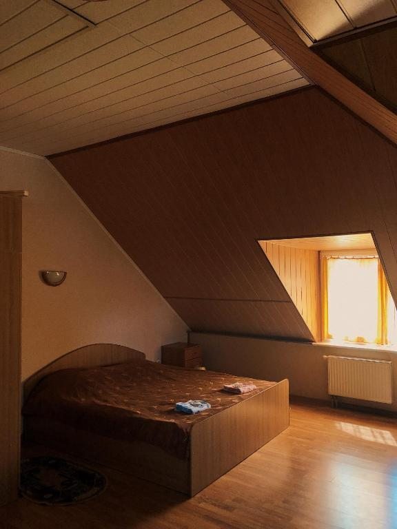 Двухместный (Двухместный номер Делюкс с 1 кроватью и дополнительной кроватью) гостевого дома Навигатор, Светлогорск