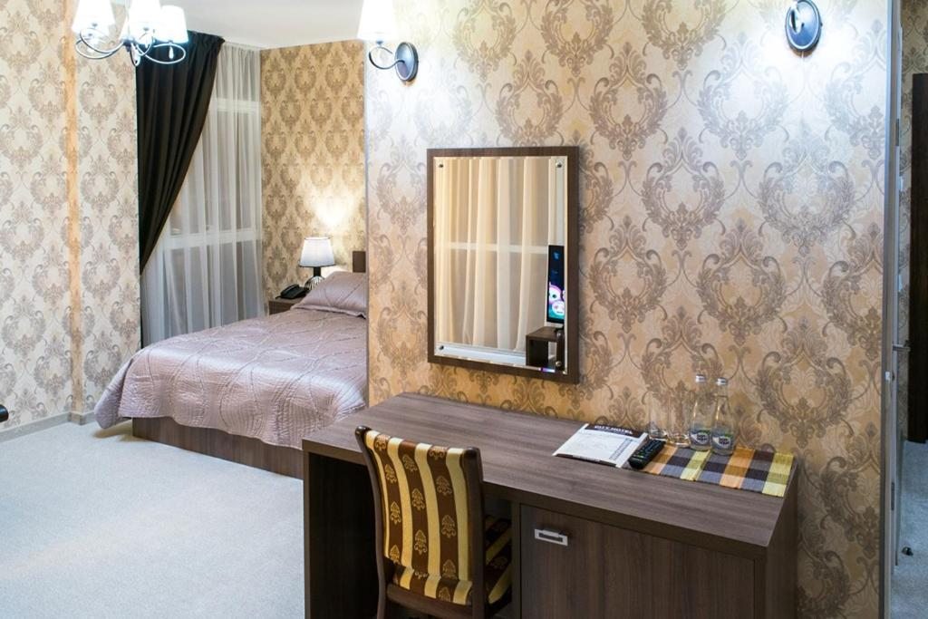 Двухместный (Улучшенный двухместный номер с 1 кроватью) отеля CityHotel, Сургут