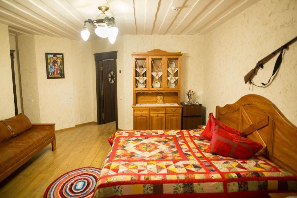 Двухместный (Улучшенный двухместный номер с 1 кроватью или 2 отдельными кроватями) отеля Гнездо Беркута, Сургут