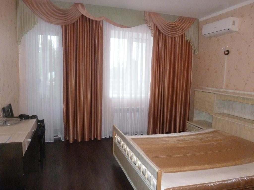 Двухместный (Двухместный номер Делюкс с 1 кроватью и душем) отеля Мини-отель Уют, Павлово
