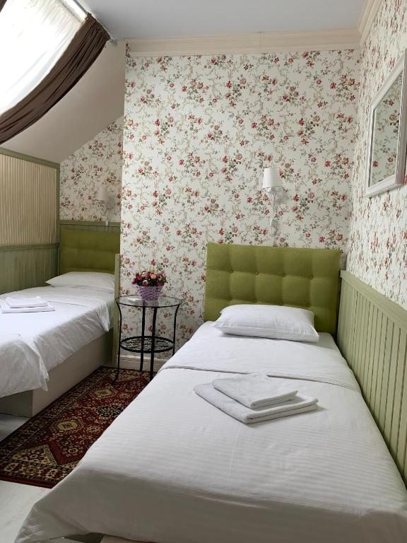 Трехместный (Трехместный номер с 3 отдельными кроватями) мини-отеля Вояж, Болгар