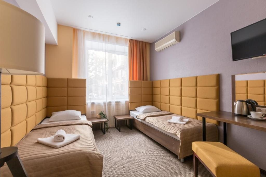 Двухместный (Улучшенный двухместный номер с 2 отдельными кроватями) гостиницы Myhotel24 Voikovskaya, Москва