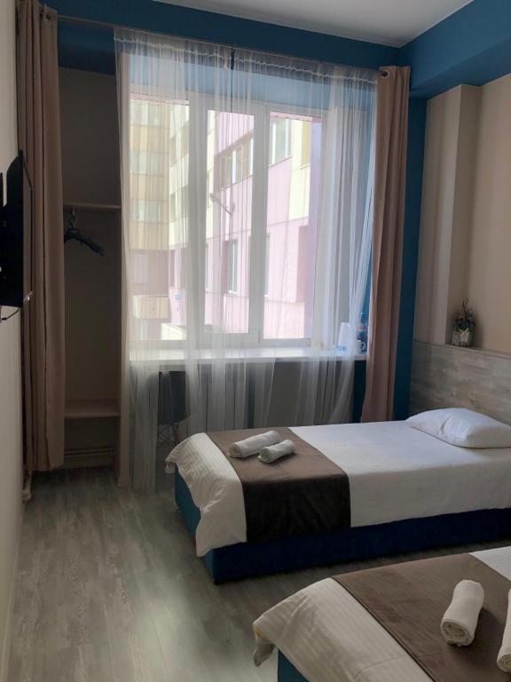 Двухместный (Двухместный номер с 1 кроватью или 2 отдельными кроватями) отеля 7 комнат, Новокузнецк