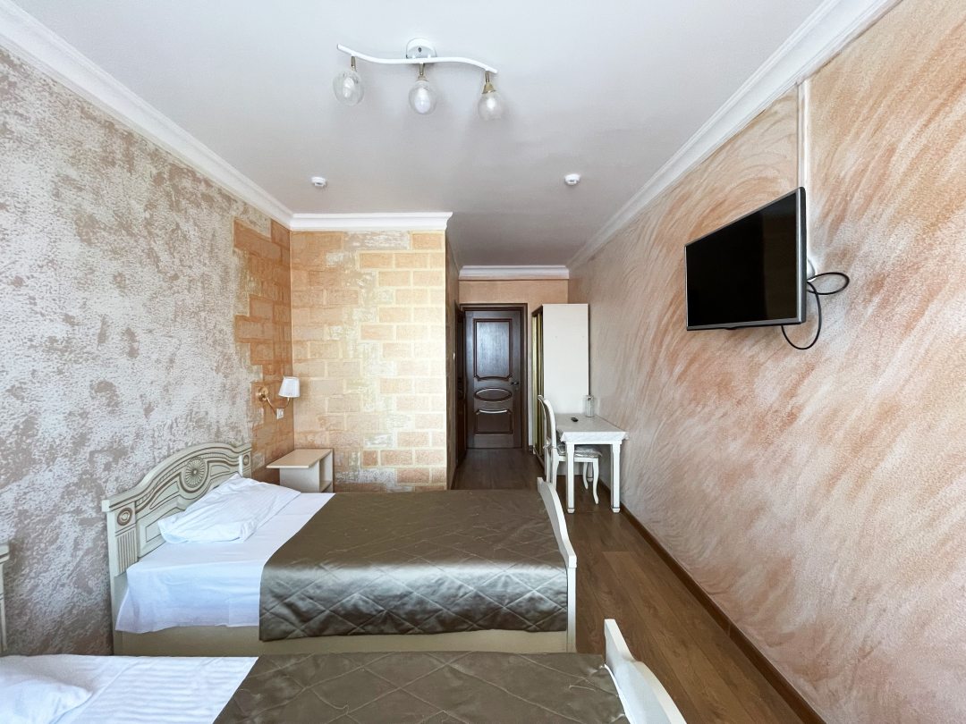 Двухместный (Двухместный номер с 2 отдельными кроватями и видом на город) гостиницы Апельсин, Дербент