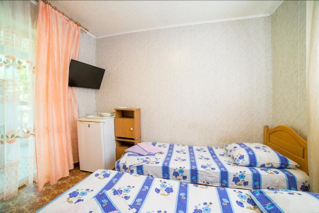 Двухместный (Двухместный номер с 2 отдельными кроватями и душем) отеля Parfenon, Дивноморское