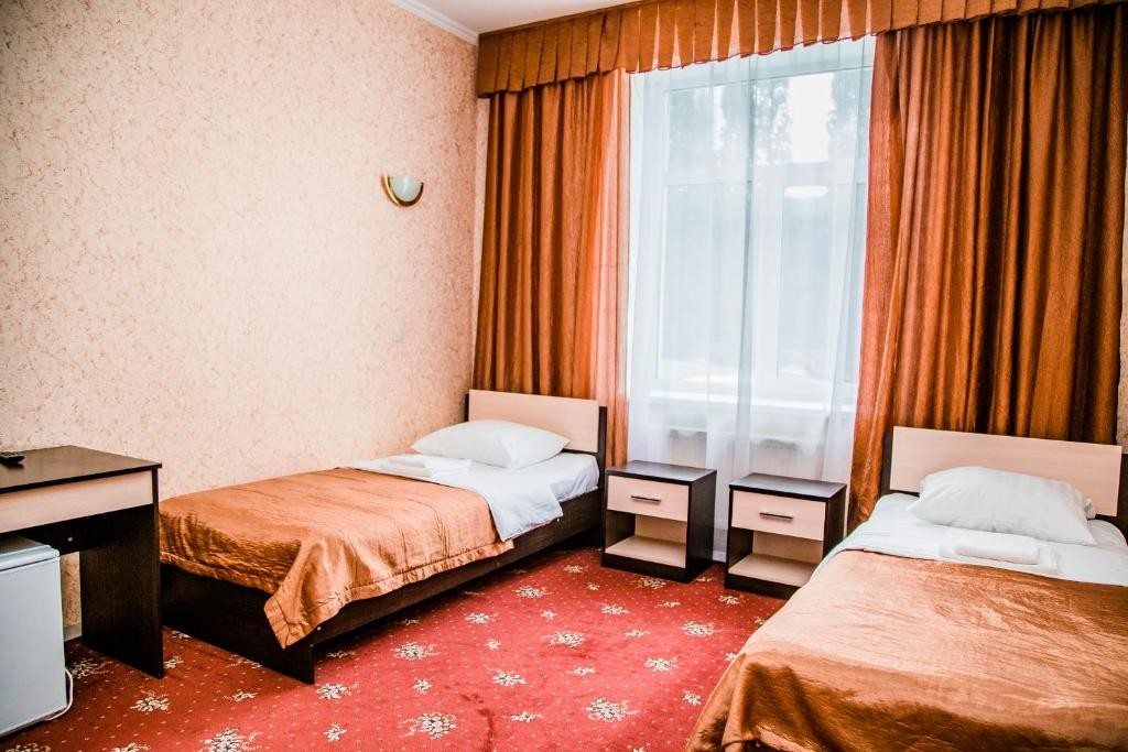 Двухместный (Стандартный двухместный номер с 2 отдельными кроватями) отеля Hotel De Luna, Домодедово