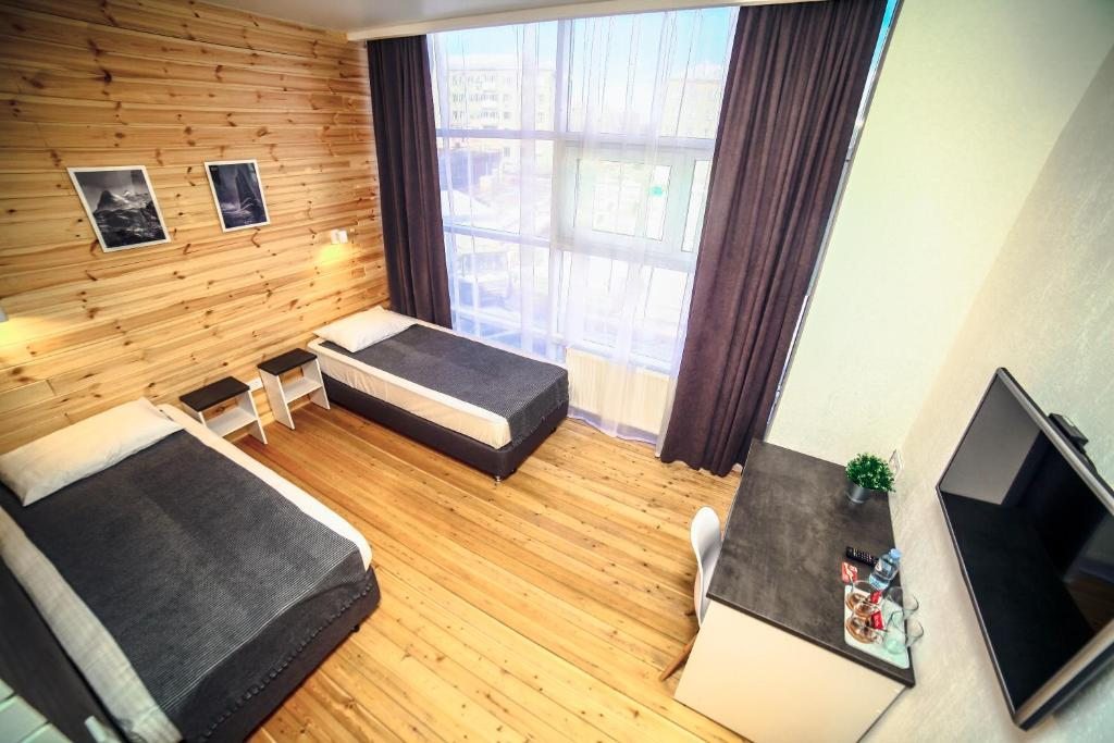 Двухместный (Улучшенный двухместный номер с 1 кроватью или 2 отдельными кроватями) отеля Business hotel, Магнитогорск