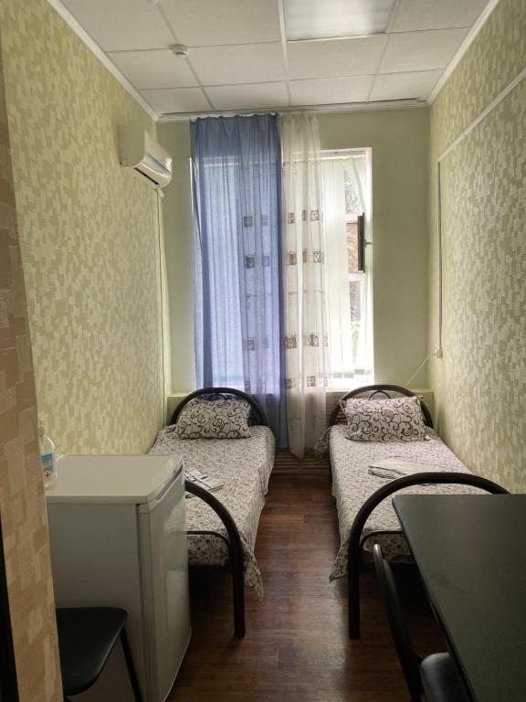 Двухместный (Бюджетный двухместный номер с 2 отдельными кроватями) отеля Чайка, Кущёвская