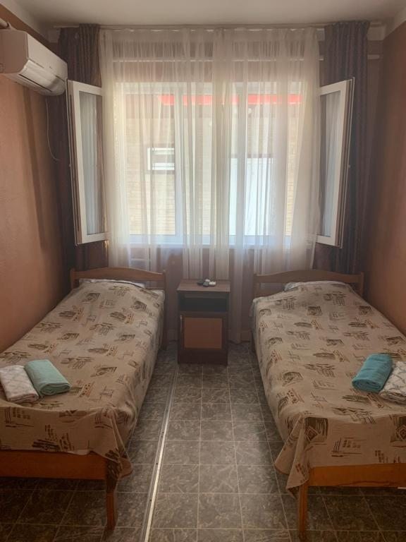 Двухместный (Бюджетный двухместный номер с 2 отдельными кроватями) гостевого дома Мидори, Лазаревское