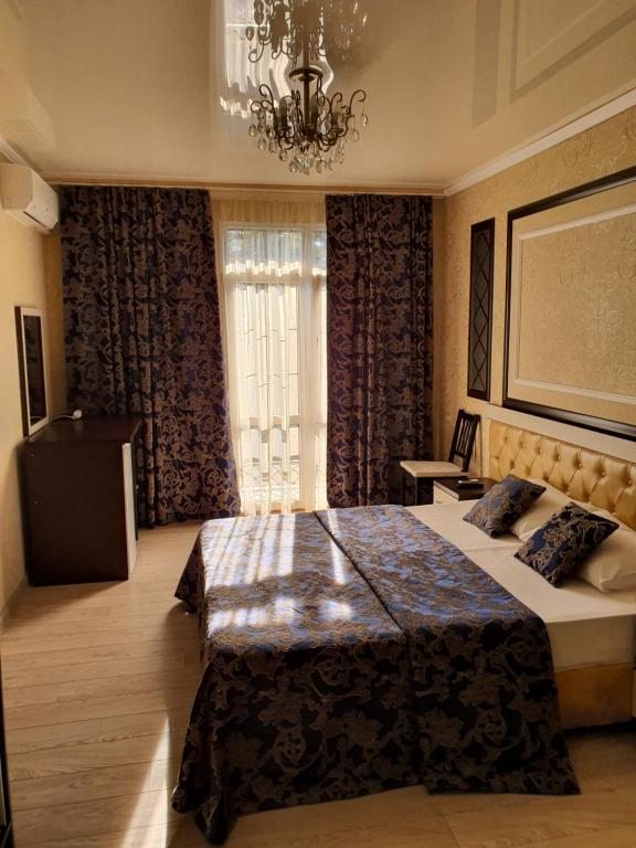 Двухместный (Двухместный номер Делюкс с 1 кроватью или 2 отдельными кроватями и балконом) гостевого дома MarkHills, Лазаревское