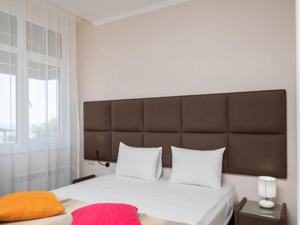 Двухместный (Двухместный номер Делюкс с 1 кроватью или 2 отдельными кроватями и балконом) отеля Migal, Сочи