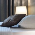 Кровать в номере апарт-отеля Атмосфера Парк, Сочи