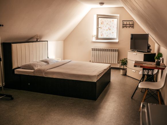 Фотография номера хостела У камина