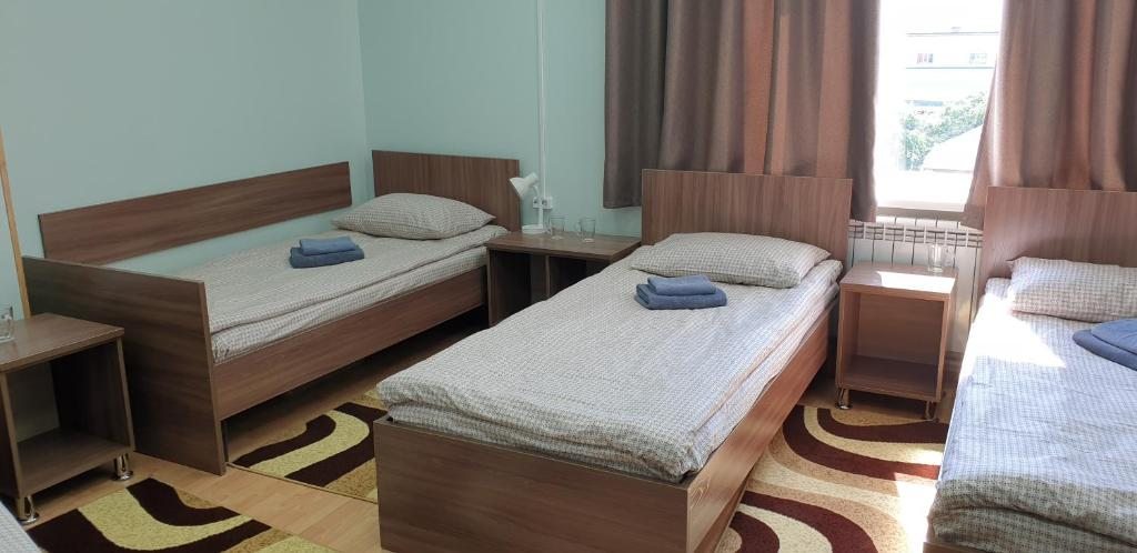 Номер (Односпальная кровать в общем номере для женщин) хостела Игман, Горно-Алтайск