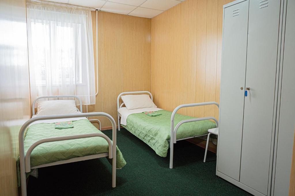 Двухместный (Бюджетный двухместный номер с 2 отдельными кроватями) отеля Зеленый, Красноярск