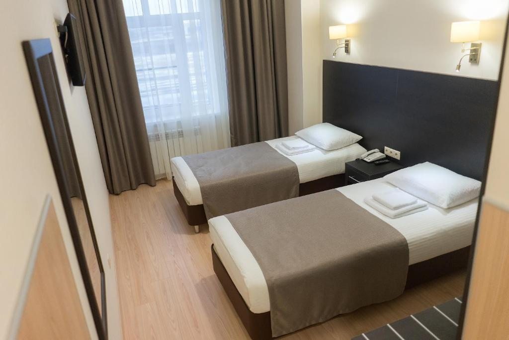 Двухместный (Стандартный двухместный номер с 2 односпальными кроватями) гостиницы Гараж, Сызрань