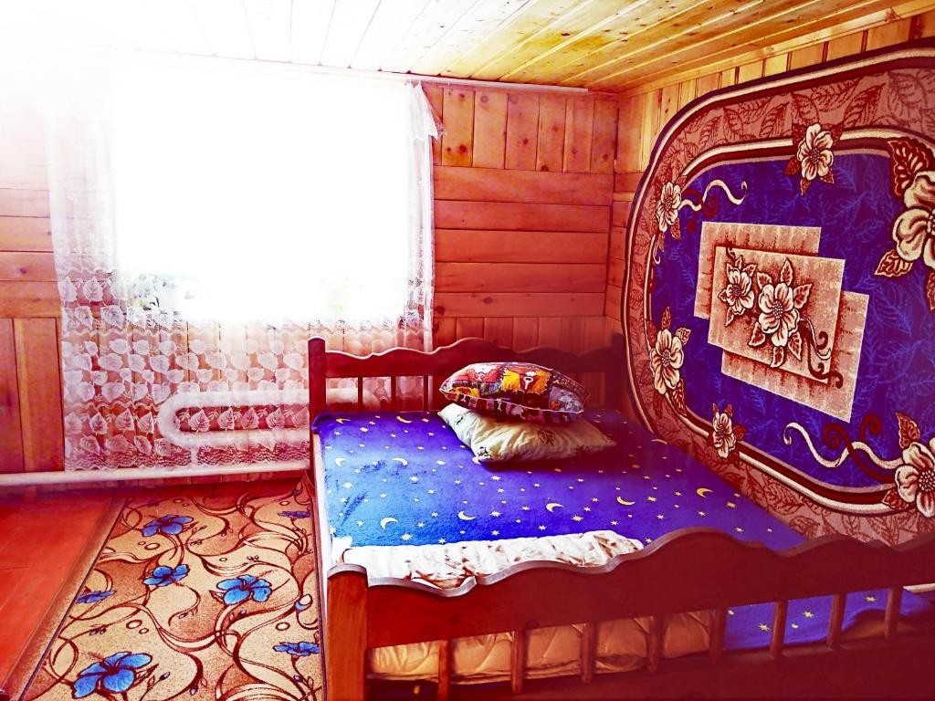 Трехместный (Трехместный номер с видом на горы) гостевого дома Усадьба Синильга, Иогач