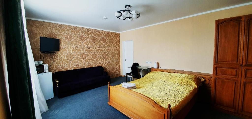 Двухместный (Просторный двухместный номер с 2 отдельными кроватями) отеля Guest House DD, Каменск-Шахтинский
