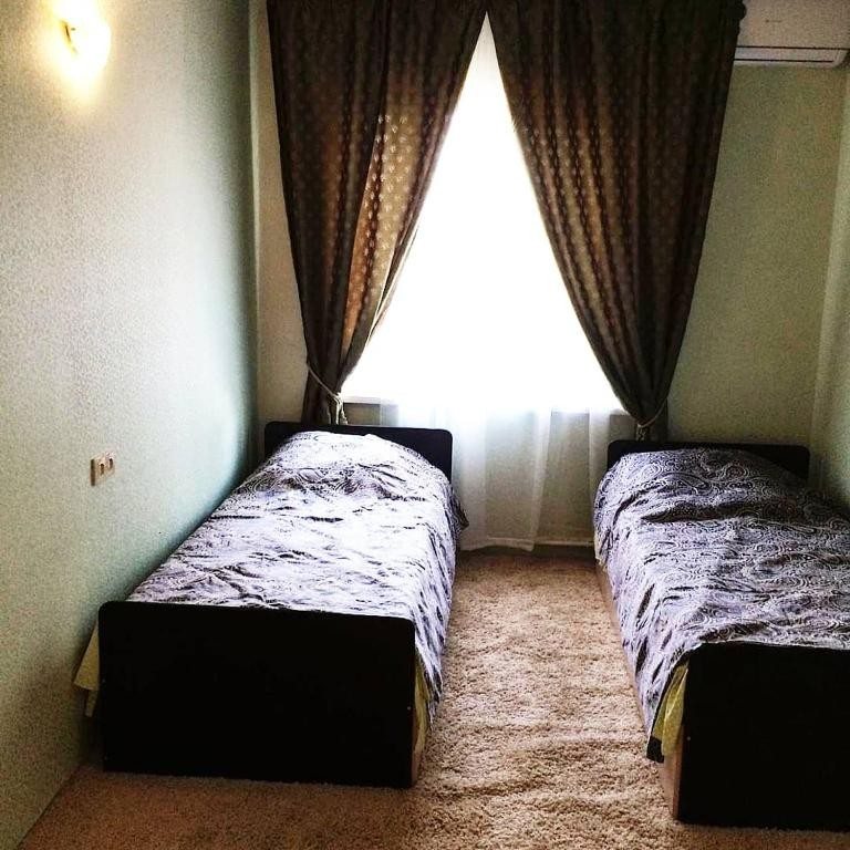 Двухместный (Бюджетный двухместный номер с 2 отдельными кроватями) гостевого дома АллаРиф, Камызяк