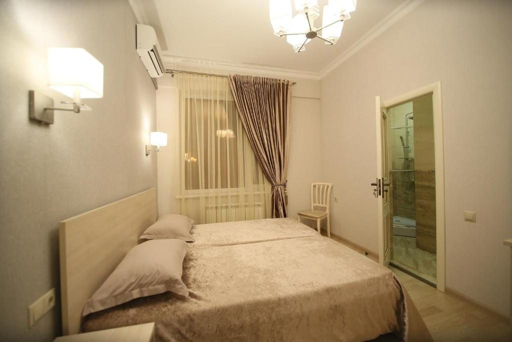 Двухместный (Двухместный номер с 2 отдельными кроватями и ванной комнатой) отеля Napoli, Кизляр