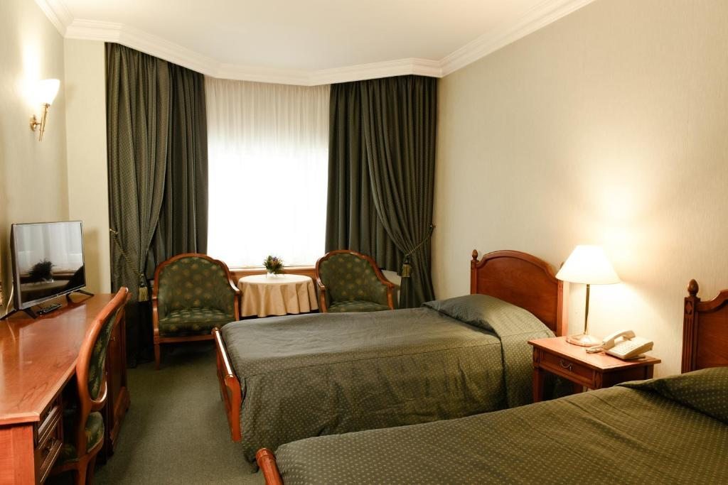 Номер (Односпальная кровать в общем номере) отеля Когалым
