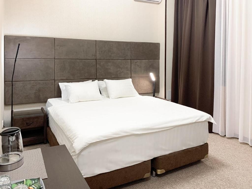 Двухместный (Стандартный двухместный номер с 1 кроватью или 2 отдельными кроватями) отеля Premiere Hotel, Невинномысск