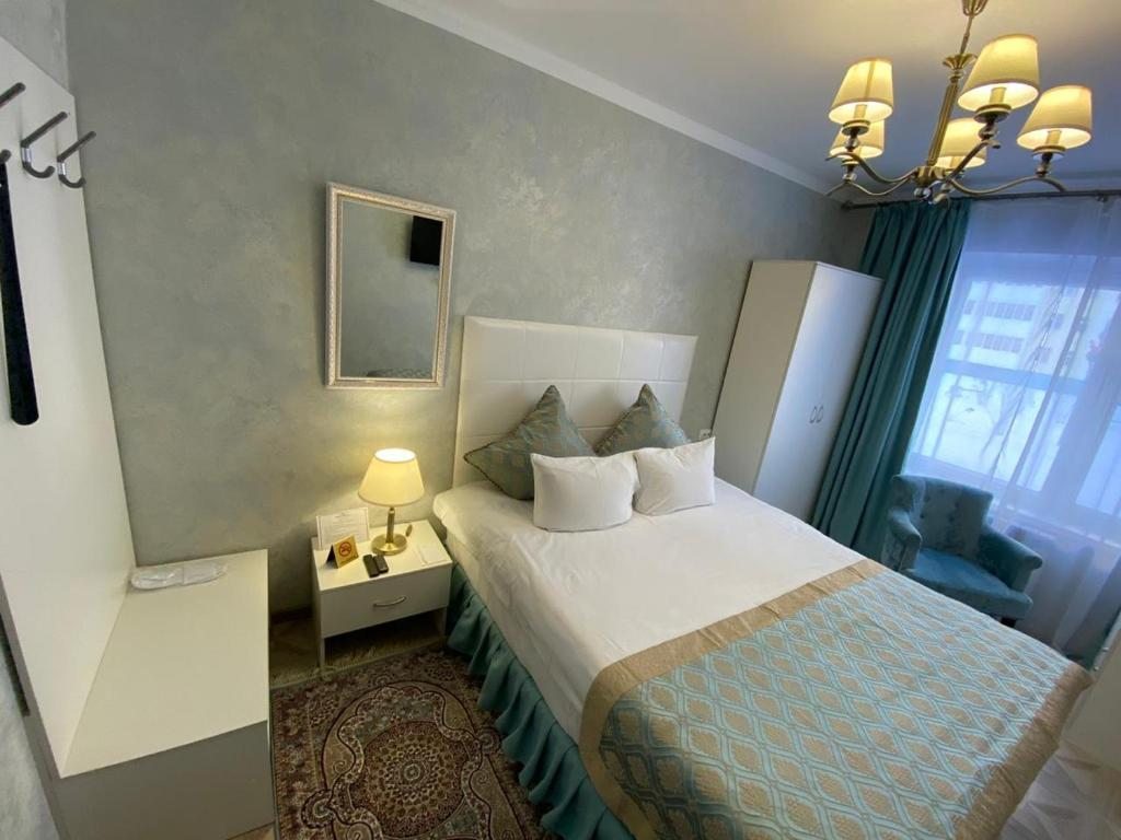 Двухместный (Двухместный номер с 1 кроватью и собственной ванной комнатой вне номера) мини-отеля Park-Hotel, Нижневартовск