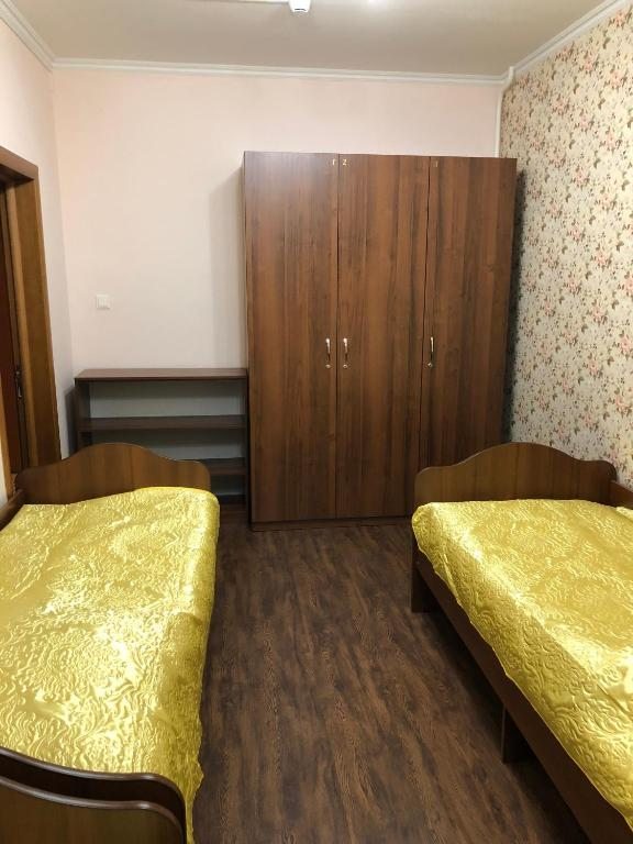Номер (Односпальная кровать в общем номере для женщин) отеля Мини-отель на Чапаева 3, Нижневартовск